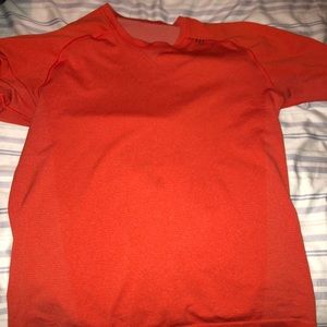 Orange lululemon athletica t-shirt